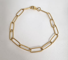 Gullhúðað armband.