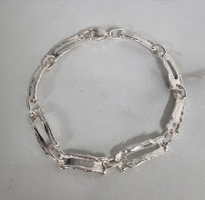 Sérsmíðað silfur armband