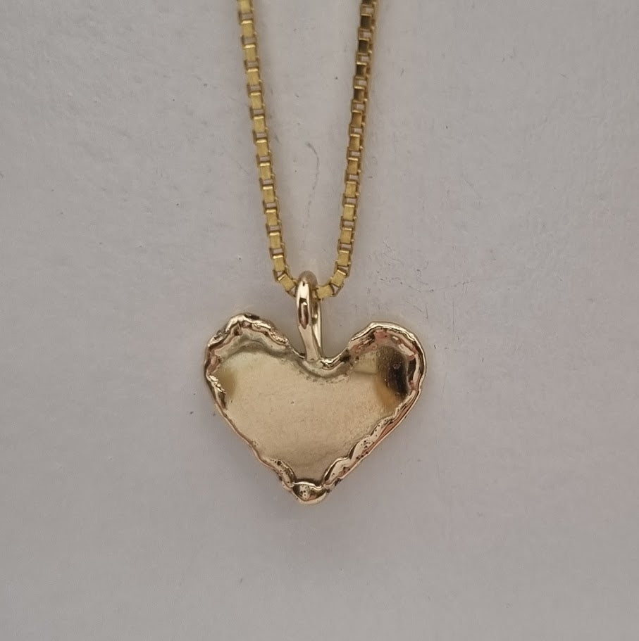 14 kt gull hálsmen lítið hjarta.