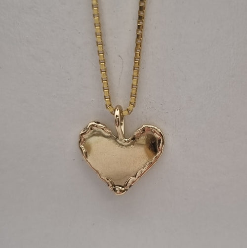 14 kt gull hálsmen lítið hjarta.